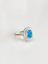 Genevieve Aqua Double Halo Ring – rhodium plated 925 sterling silver ring for women, angled view
