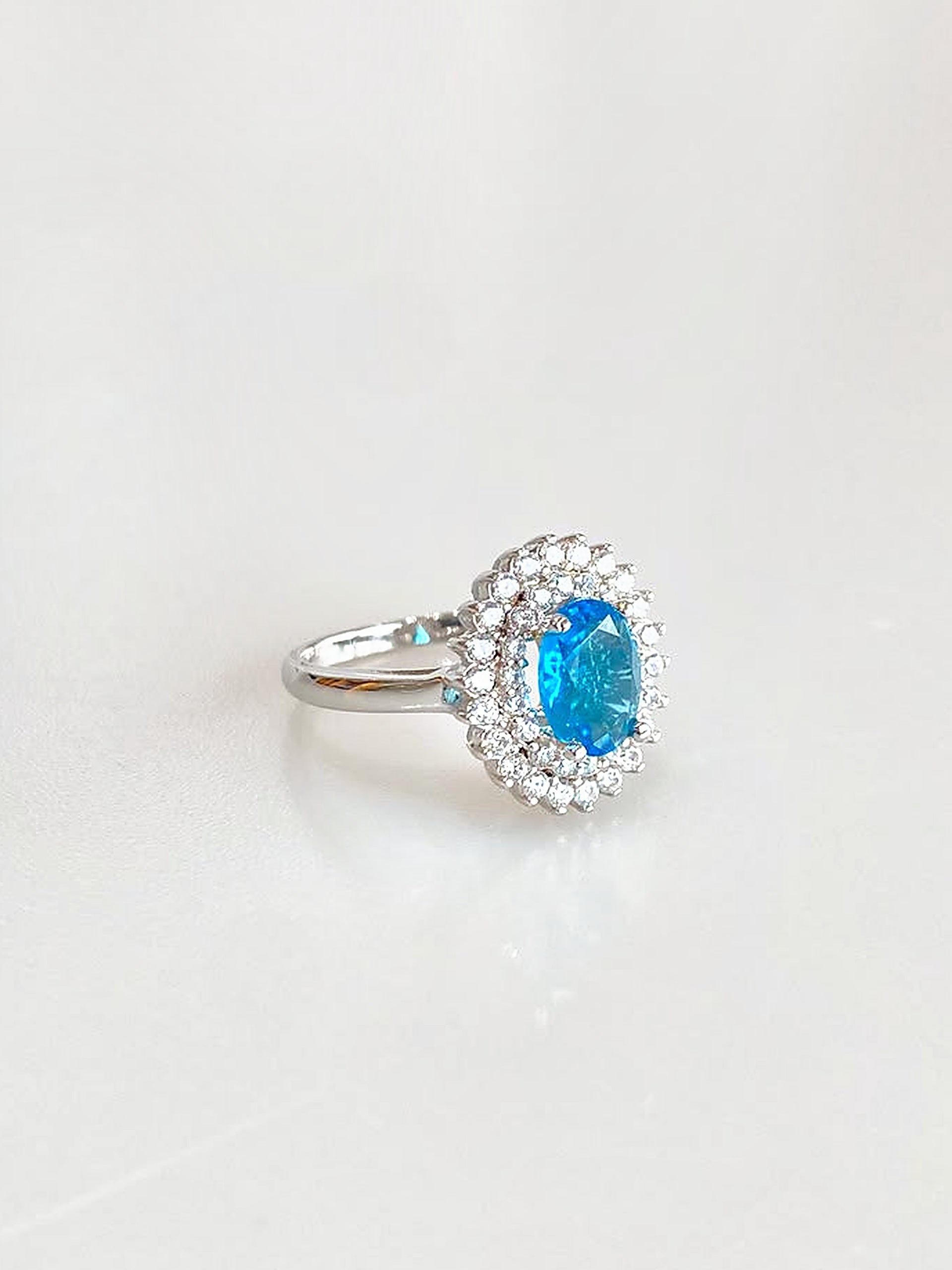 Genevieve Aqua Double Halo Ring - angled view