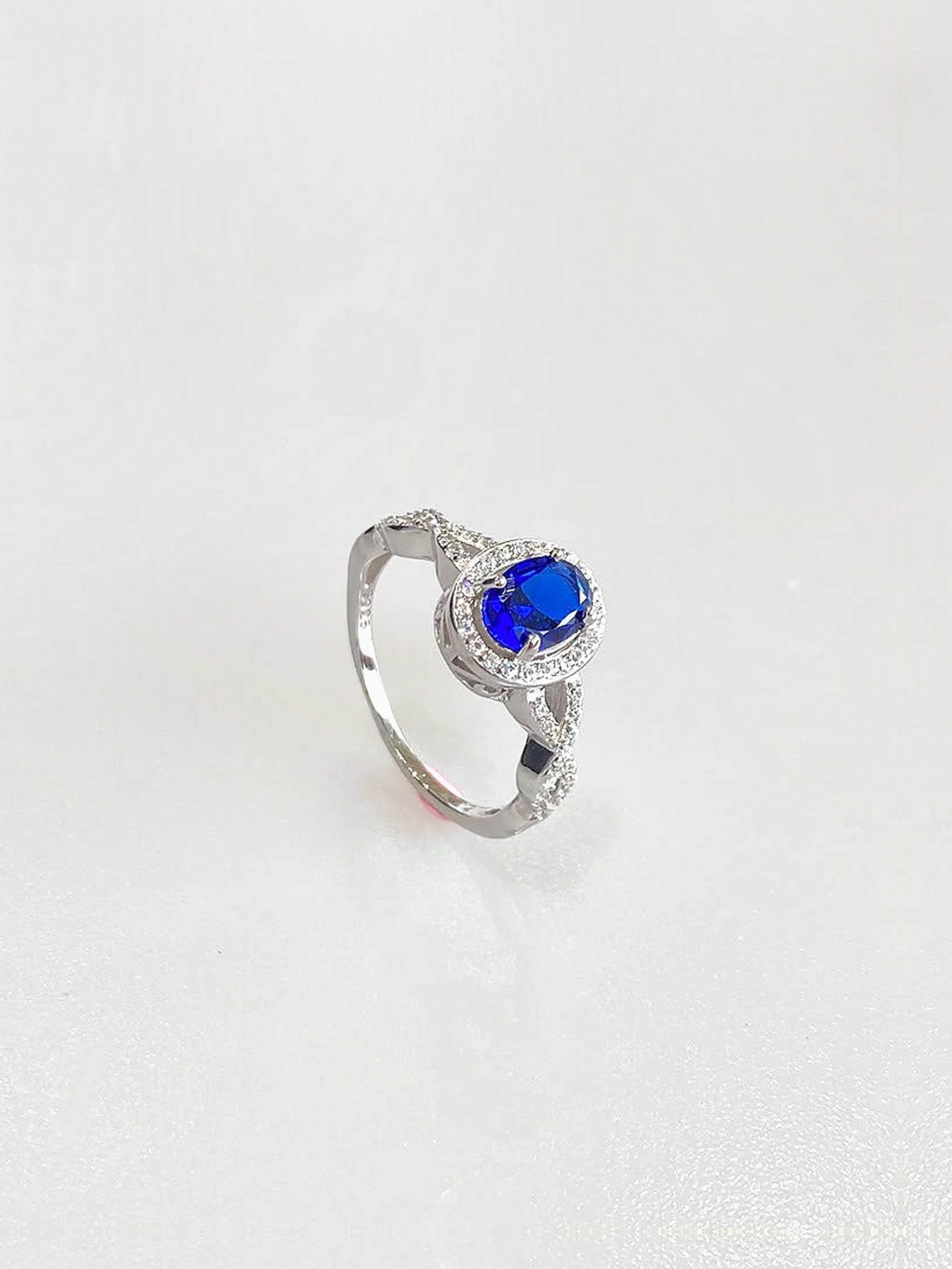 Josephine Oval Halo Ring (Deep Blue) - side view