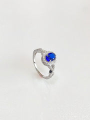 Josephine Oval Halo Ring (Deep Blue) - side view