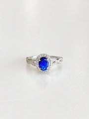 Josephine Oval Halo Ring (Deep Blue) - front view