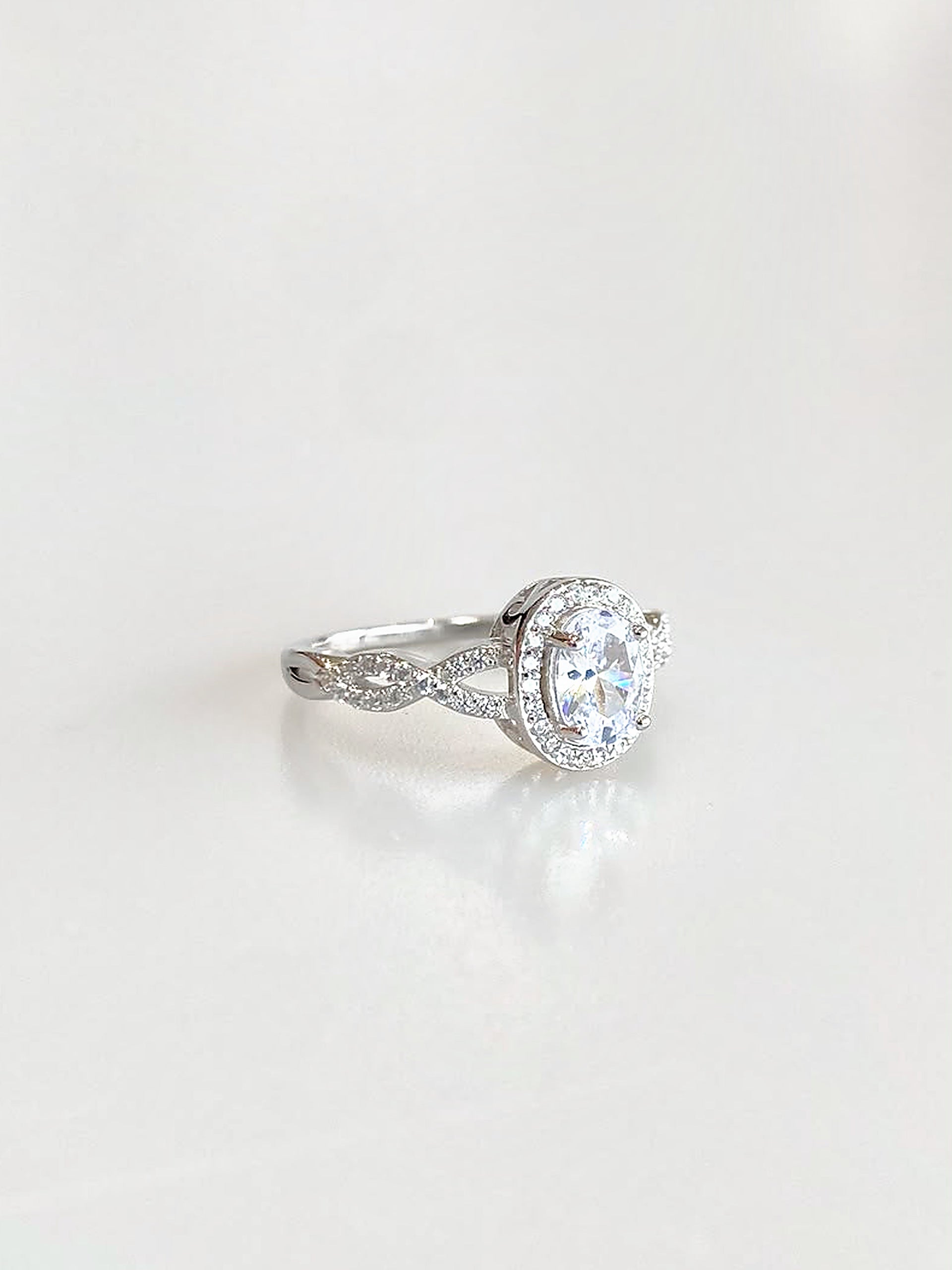 Josephine Oval Halo Ring (White) - angled view
