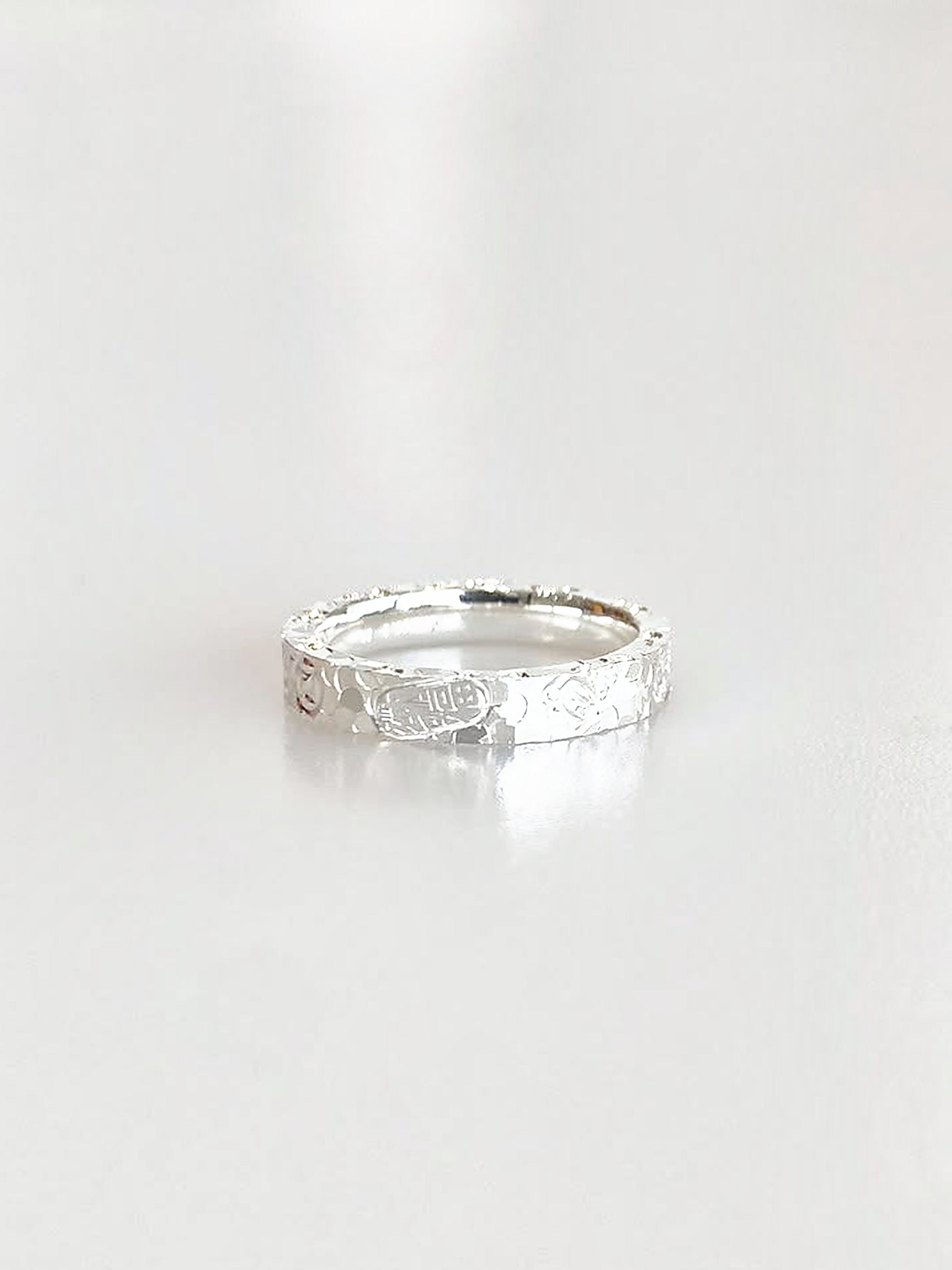 S990 Liora Textured Band Ring - angled view