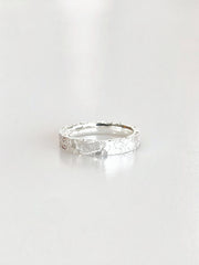 S990 Liora Textured Band Ring - angled view
