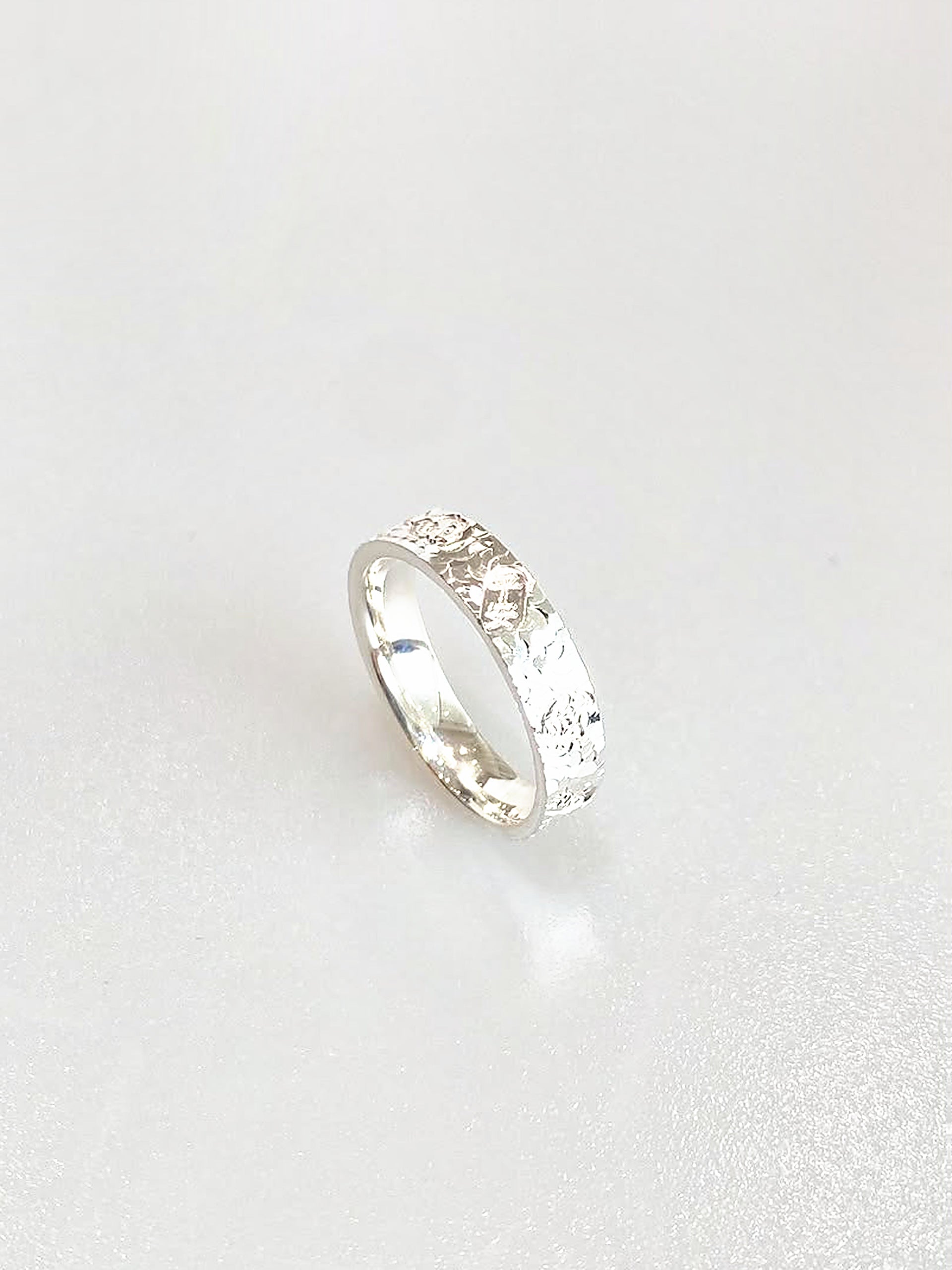 S990 Liora Textured Band Ring - angled side view